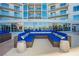 Comfortable outdoor lounge area featuring plush blue seating and sleek design, ideal for relaxation and social gatherings at 200 W Sahara Ave # 910, Las Vegas, NV 89102
