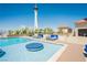 Rooftop pool area with comfortable lounge seating and a view of the Las Vegas Strip at 200 W Sahara Ave # 910, Las Vegas, NV 89102