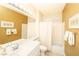 Standard bathroom with white vanity, toilet and shower-tub combo at 2106 King Mesa Dr, Henderson, NV 89012