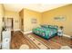 Bright bedroom with wood floors and neutral colored walls at 2106 King Mesa Dr, Henderson, NV 89012