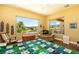 Bedroom with nice window views and comfortable sitting area at 2106 King Mesa Dr, Henderson, NV 89012