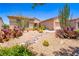 Beautiful desert landscape with cacti and gravel in a well-maintained front yard at 2106 King Mesa Dr, Henderson, NV 89012