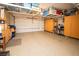 Spacious garage with epoxy flooring and overhead storage racks at 2106 King Mesa Dr, Henderson, NV 89012
