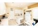 Spacious kitchen with white cabinets, an island, stainless steel appliances, and ample counter space at 2106 King Mesa Dr, Henderson, NV 89012
