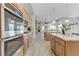 Gourmet kitchen with stainless steel appliances, double oven, and granite countertops at 2168 Big Bar Dr, Henderson, NV 89052