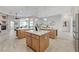 Open kitchen with granite countertops, multiple islands, and stainless steel appliances at 2168 Big Bar Dr, Henderson, NV 89052
