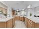 Spacious kitchen with a farm sink, stainless steel appliances, and granite countertops at 2168 Big Bar Dr, Henderson, NV 89052