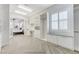 Large walk-in closet featuring custom shelving and a view to the main bedroom at 2168 Big Bar Dr, Henderson, NV 89052