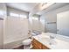 Bathroom features a vanity with sink, mirror, toilet and a shower over tub at 2177 Hidden Ranch Ter, Henderson, NV 89052