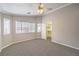 Bright bedroom featuring neutral paint, carpet, and a walk-in closet at 2177 Hidden Ranch Ter, Henderson, NV 89052