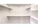 This walk-in closet features an adjustable shelving system, providing ample storage space at 2177 Hidden Ranch Ter, Henderson, NV 89052