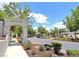 Inviting community entrance with manicured landscaping and a grand 'Premiere' archway at 2177 Hidden Ranch Ter, Henderson, NV 89052