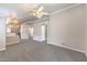 Expansive living room with neutral carpet, recessed lighting, and open layout at 2177 Hidden Ranch Ter, Henderson, NV 89052