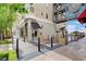 Charming shops with inviting storefronts line this beautifully landscaped walkway, complete with stylish planters and pedestrian bridge at 2177 Hidden Ranch Ter, Henderson, NV 89052