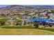 Elevated view of the neighborhood park surrounded by houses, mountains in the background at 23 Hudson Canyon St # 3, Henderson, NV 89012