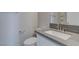 Bathroom sink featuring stone counters and modern fixtures at 23 Hudson Canyon St # 3, Henderson, NV 89012