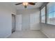 Bedroom featuring a ceiling fan, easy access to closets and bathroom, and a plush carpet at 23 Hudson Canyon St # 3, Henderson, NV 89012