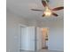 Comfortable bedroom featuring a ceiling fan and easy access to closets and bathroom at 23 Hudson Canyon St # 3, Henderson, NV 89012