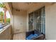 Cozy balcony with a chair and a view of lush greenery at 2725 S Nellis Blvd # 2168, Las Vegas, NV 89121