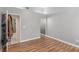 Neutral toned bedroom with wood flooring and access to another room at 2725 S Nellis Blvd # 2168, Las Vegas, NV 89121