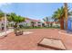 Well maintained community area featuring a horseshoe pit, benches, and grassy picnic area at 2725 S Nellis Blvd # 2168, Las Vegas, NV 89121