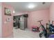 Open view of the kitchen with stainless steel appliances and tile flooring at 2725 S Nellis Blvd # 2168, Las Vegas, NV 89121