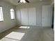 Bedroom featuring neutral paint, a ceiling fan, a closet, and plush carpeting at 2905 Shimmering Bay St, Laughlin, NV 89029