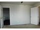 Bedroom featuring neutral paint, two doors, a ceiling fan, and plush carpeting at 2905 Shimmering Bay St, Laughlin, NV 89029
