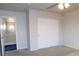 Bedroom featuring neutral paint, a ceiling fan, a closet, and plush carpeting at 2905 Shimmering Bay St, Laughlin, NV 89029