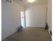 View of an empty garage with neutral walls and floors at 2905 Shimmering Bay St, Laughlin, NV 89029