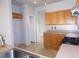 Walk-in pantry with cabinets, tile floors, and interior shelving at 2905 Shimmering Bay St, Laughlin, NV 89029