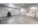 Spacious basement area with wood-look floors, bright lighting, and plenty of storage at 3400 Sioux Way, Las Vegas, NV 89169