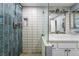 A clean bathroom that features a glass shower with a built in soap niche next to a modern style sink at 3400 Sioux Way, Las Vegas, NV 89169