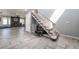 Living room with tile flooring and stair access at 3400 Sioux Way, Las Vegas, NV 89169