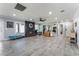 Large living room with ceramic tile and fireplace at 3400 Sioux Way, Las Vegas, NV 89169