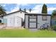 Two storage sheds and artificial grass area in the backyard for storing your tools and toys at 3400 Sioux Way, Las Vegas, NV 89169