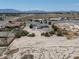 A birds eye view of the residence and surrounding lot featuring some trees at 3451 Sagebrush Ave, Pahrump, NV 89048