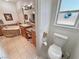 Bathroom with a tub, toilet and sink at 3451 Sagebrush Ave, Pahrump, NV 89048