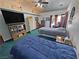 Spacious bedroom featuring two beds, vaulted ceilings, and decor that gives it a cozy vibe at 3451 Sagebrush Ave, Pahrump, NV 89048