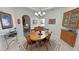 Charming dining room featuring a wood table, cabinetry and natural light at 3451 Sagebrush Ave, Pahrump, NV 89048