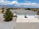 Expansive ranch-style home with attached two-car garage and beautiful mountain views at 3451 Sagebrush Ave, Pahrump, NV 89048