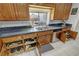 Classic kitchen cabinets with stainless steel appliances and pull-out shelving at 3451 Sagebrush Ave, Pahrump, NV 89048