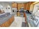 Updated kitchen with stainless steel appliances, granite countertops, and wooden cabinets at 3451 Sagebrush Ave, Pahrump, NV 89048
