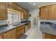 Well-lit kitchen with granite countertops, stainless steel appliances, and a spacious feel at 3451 Sagebrush Ave, Pahrump, NV 89048
