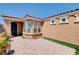 Paver patio with desert landscaping offers a private outdoor space at 3616 Greenbriar Bluff Ave, North Las Vegas, NV 89081
