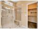 Modern glass shower with walk-in closet attached in the bathroom at 3616 Greenbriar Bluff Ave, North Las Vegas, NV 89081