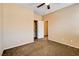 Bedroom with carpet flooring, ceiling fan, closet and door to another room at 3616 Greenbriar Bluff Ave, North Las Vegas, NV 89081