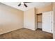 Bedroom with carpet flooring, closet and door to another room at 3616 Greenbriar Bluff Ave, North Las Vegas, NV 89081