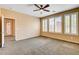 Bright bedroom featuring a ceiling fan and windows, perfect for relaxing at 3616 Greenbriar Bluff Ave, North Las Vegas, NV 89081
