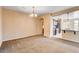 This dining room features natural light and access to the kitchen at 3616 Greenbriar Bluff Ave, North Las Vegas, NV 89081